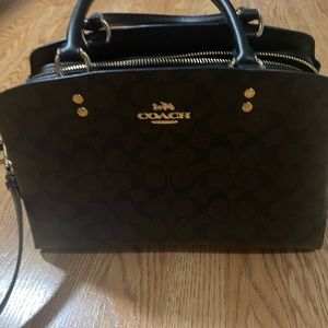 A coach purse. It has been used only hand full of times in excellent condition.